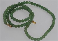 Jade necklace with a silver gilt clasp
