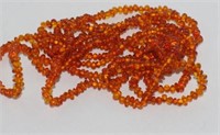 Opera length amber bead necklace