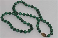 Individually knotted malachite necklace
