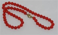 Coral necklace with 9ct gold leaf shaped clasp