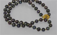 Black pearl and peridot bead necklace