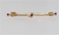 18ct yellow gold and gemset bar brooch