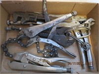 Vice grips, pipe wrench, chain vice, etc