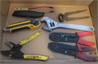 2 Utility knives, 2 wire strippers, AC tester,