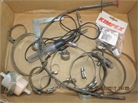 Assortment of pipe clamps, 12V tester, etc