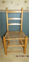 Ladder back side chair with hand woven seat