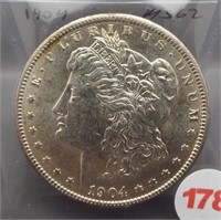 1904 Morgan silver dollar. BU, Better date.