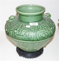 Green chinese pot on stand