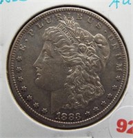 1883-S Morgan silver dollar. AU, Key date.