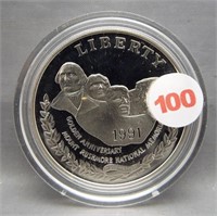 1991 Proof Mt. Rushmore silver dollar.