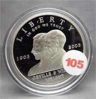2003 Proof Orville & Wilbur Wright silver dollar.