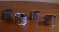 Four vintage napkin rings