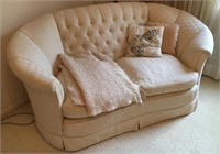 Cream upholstered settee