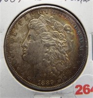 1889 Morgan silver dollar. BU toned.