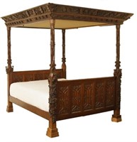 An Antique highly carved 4 Poster bed
