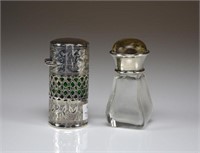 TWO ENGLISH SILVER MOUNTED SCENT BOTTLES
