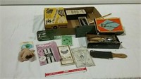 Vintage hair clippers, golf putter, drafting tools