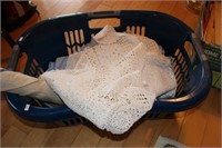 laundry basket with  table clothes