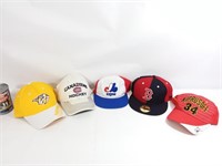 5 casquettes sportives dont une des Expos