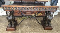 Highly ornate winged Griffin sofa/entry table