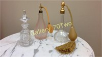 Selection of antique perfume bottles – one is an