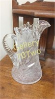 Sawtooth handle cut crystal pitcher approximately