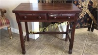 Small antique desk approximately 3 feet long by 1
