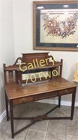 Antique wood carved mirrored back desk with brass