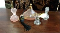 Selection of antique perfume bottles-tallest is