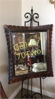 Antique highly carved beveled wood mirror