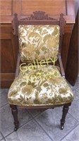 Antique highly carved Eastlake style chair