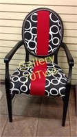 Large studded accent chair with tufted seat and