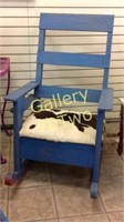 Large antique wood rocking chair with cowhide