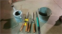 Pruners, sprinkling can and galvanized pail
