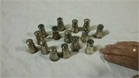 15 small shakers all marked  Sterling