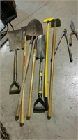 Shovel, scrapers and assorted garden tools