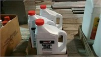 3 full 80 fluid ounce containers of diesel fuel