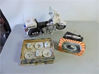 Toy motorcycle, race car and child's tea set