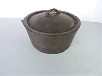 Antique cast iron pot with lid