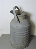 Antique galvanized milk can