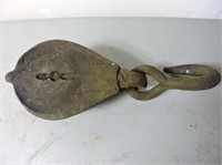 Antique metal pulley with hook