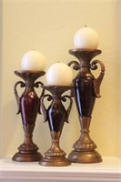 Three Urn Shaped Candle Stands in Gold