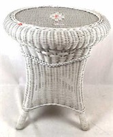 Small wicker table with a round top