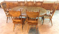 Oak Table with 1 Leaf and 7 Pressed Back Chairs