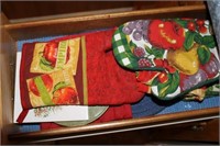 CONTENTS OF DRAWER:  KITCHEN TOWELS, POT HOLDERS,