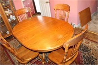 OAK PEDISTAL BASE DINING TABLE AND 4 CHAIRS