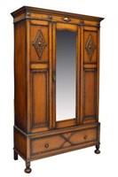 ENGLISH JACOBEAN STYLE CARVED OAK ARMOIRE, 1930S