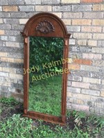 Large wood framed mirror with carving detail
