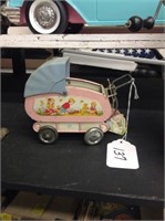 Vintage tin baby stroller