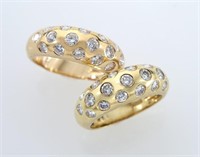 (2) Giovani 18K gold and diamond dome rings,